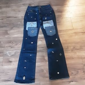 Dark washed vintage inspired embellished jeans